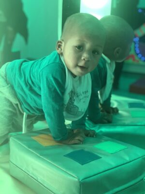 Image of baby in the sensory room at the MBU